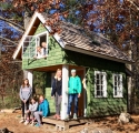 Kids working on a Cedar Siding Project